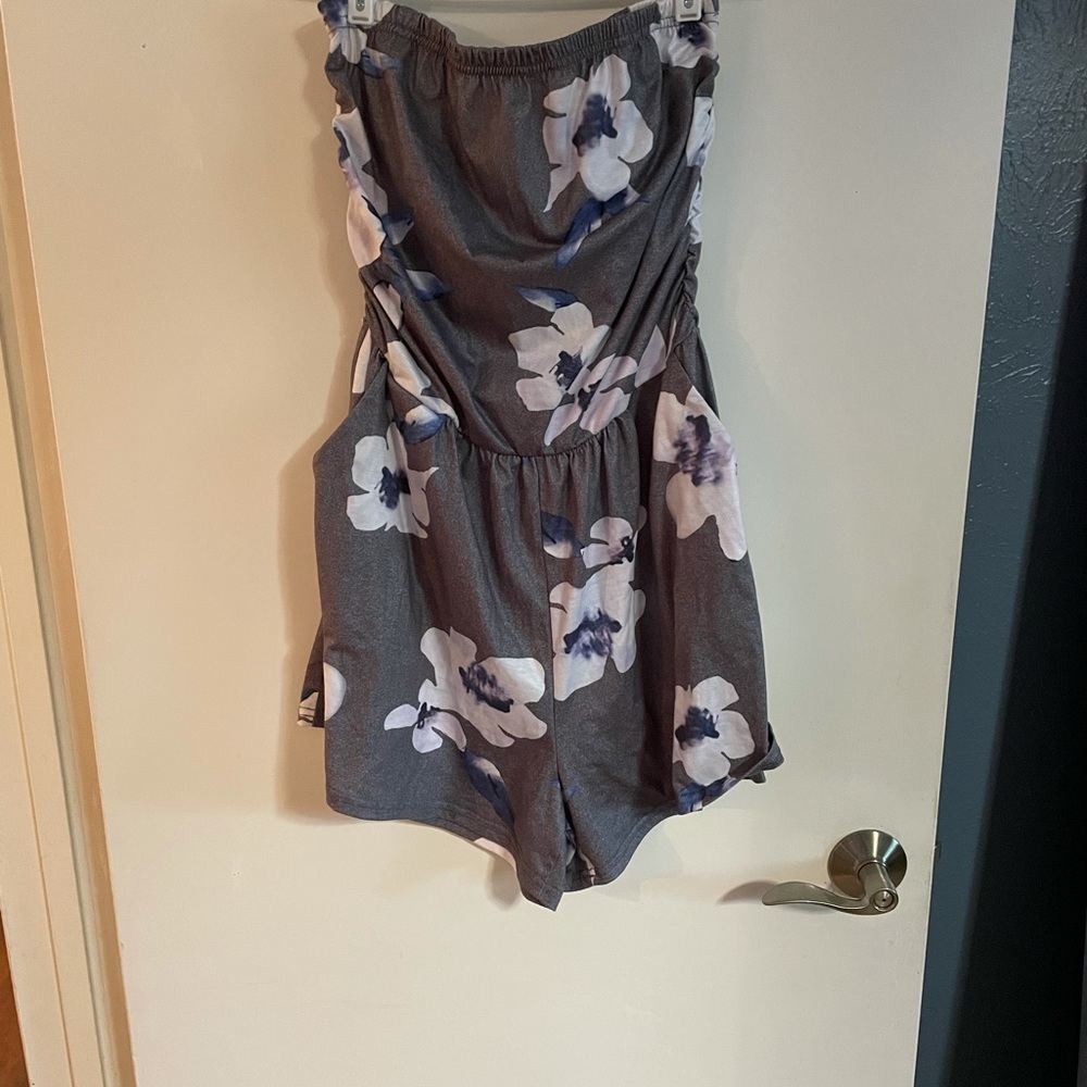 Floral romper. Never worn.